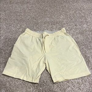 Men's yellow LuLulemon Shorts